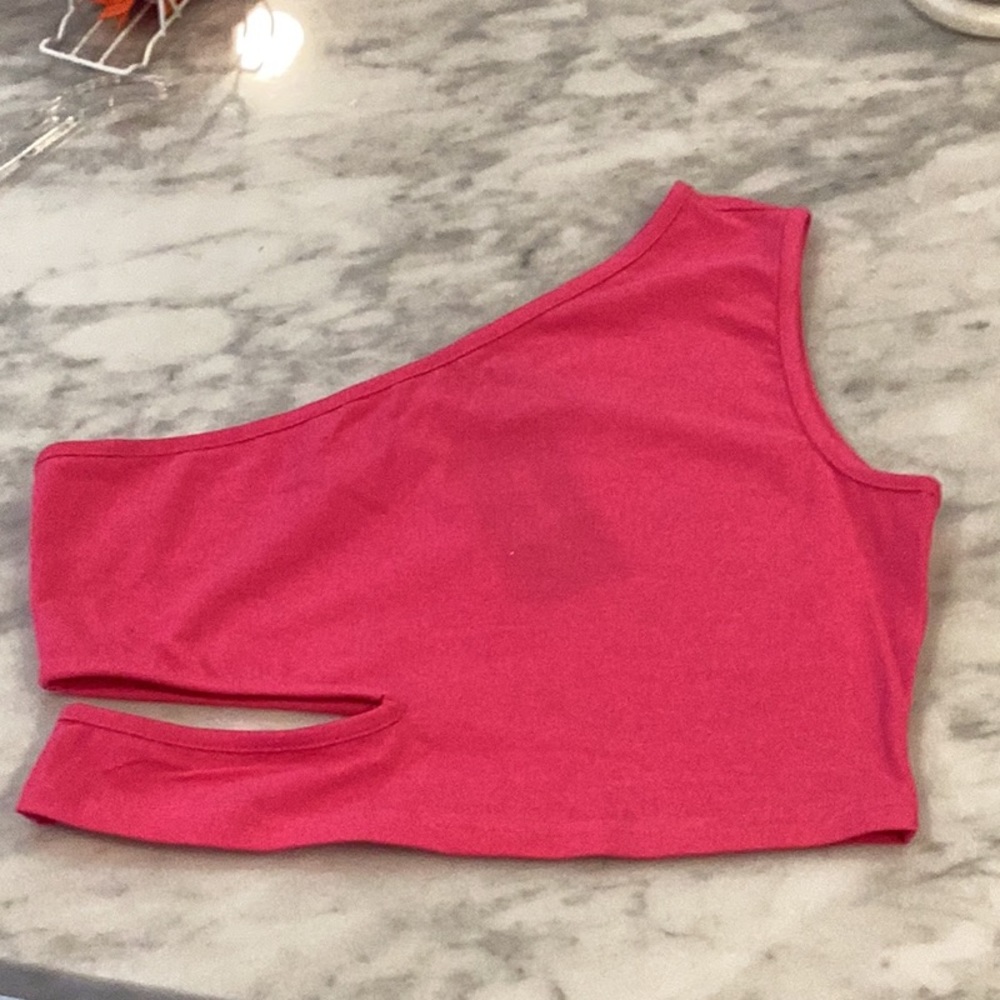 Hot pink one shoulder tank with side cut out. Brand new with tags.